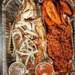 Whole Fried tilapia/ jollof & fried plantains